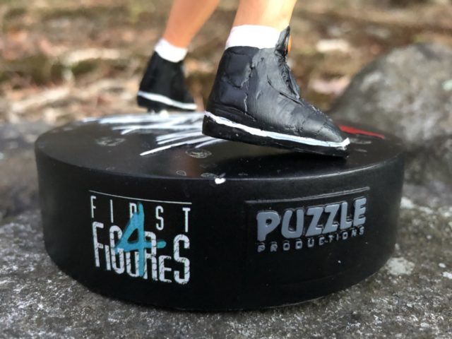 F4F Puzzle Productions Logos on John Cena Figure Base